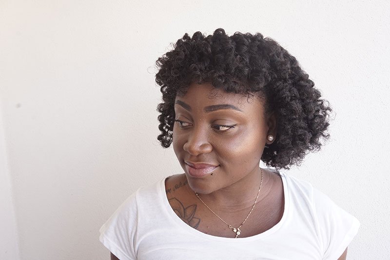 carré de boucles à franges sur cheveux crépus